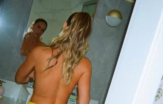 Giovanna Ewbank publica topless com mão boba de Bruno Gagliasso