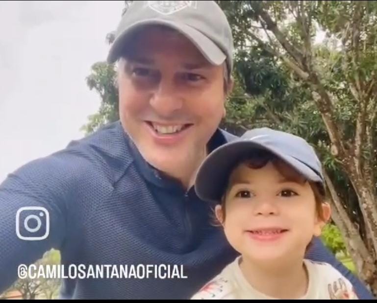 Com o filho José no colo, Camilo Santana deseja boa sorte aos participantes do Enem