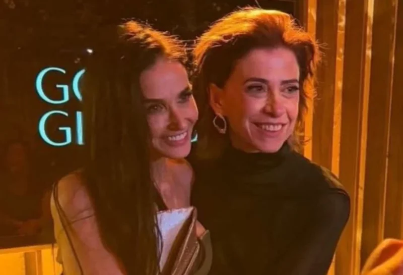 Demi Moore e Fernanda Torres se encontram em premiação do Globo de Ouro 2025