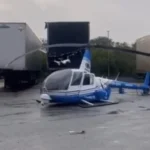 Helicóptero da Band faz pouso forçado dentro de garagem de empresa em SP